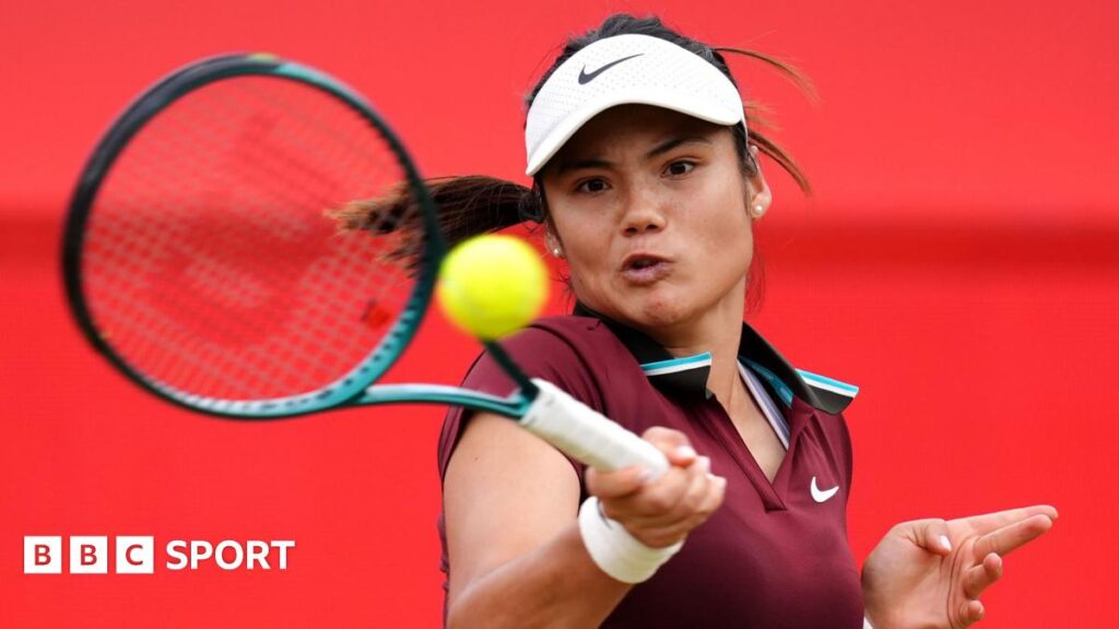 Emma Raducanu plays a stroke during her defeat by Zheng Qinwen