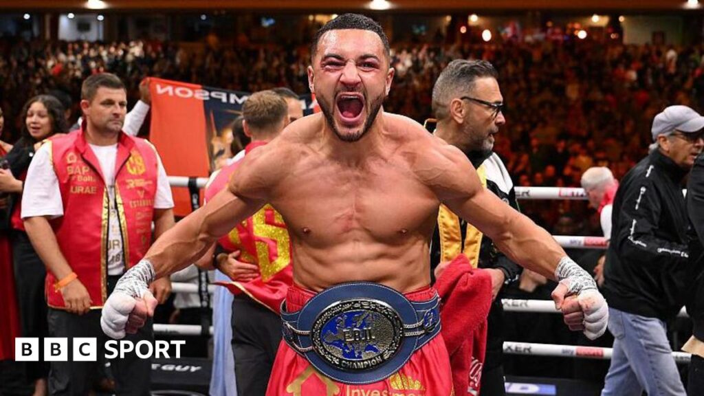 Callum Simpson celebrating with the European title around his waist