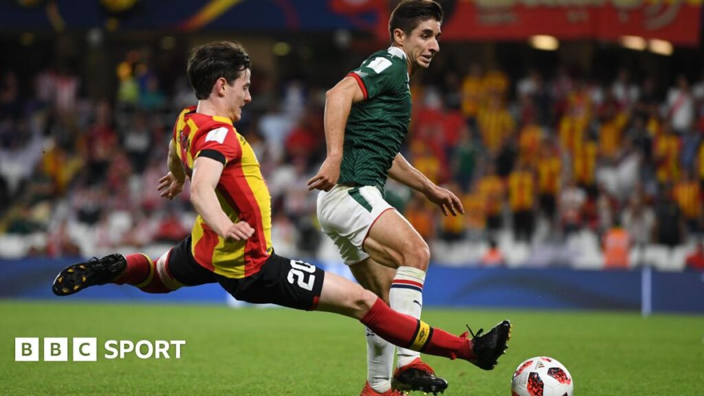 Ayman Ben Mohamed makes a tackle at the Club World Cup