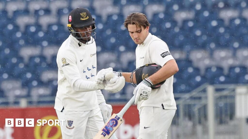Jofra Archer (left) congratulates James Coles for his Sussex century versus Durham