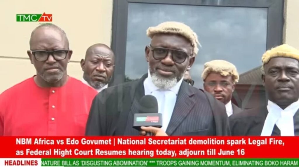 NBM lead legal counsel Chief Reginald Asiuwhu addressing reporters at the court after the first hearing of the matter at the Federal High Court premises in Benin, Edo State