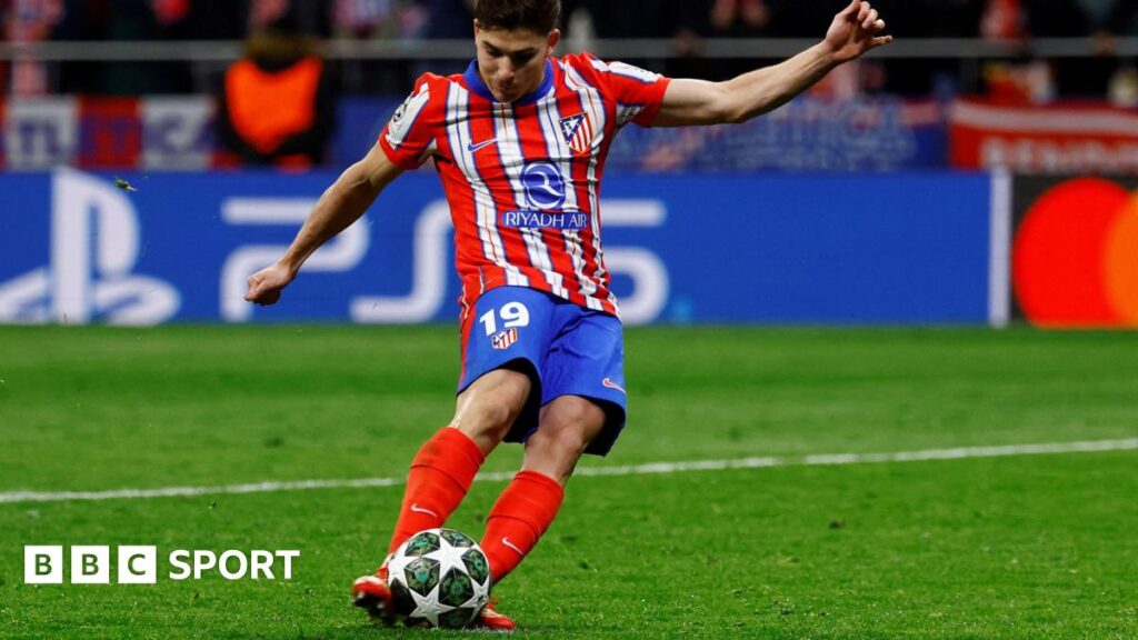 Atletico Madrid's Julian Alvarez scores a penalty during a shootout against Real Madrid which is later disallowed