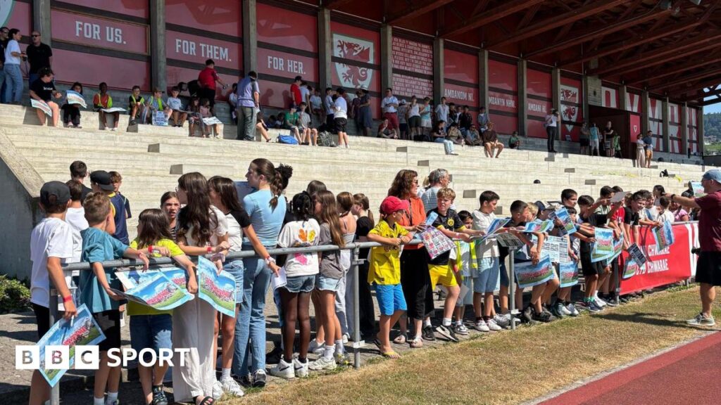 Wales were greeted by hundreds of local school children