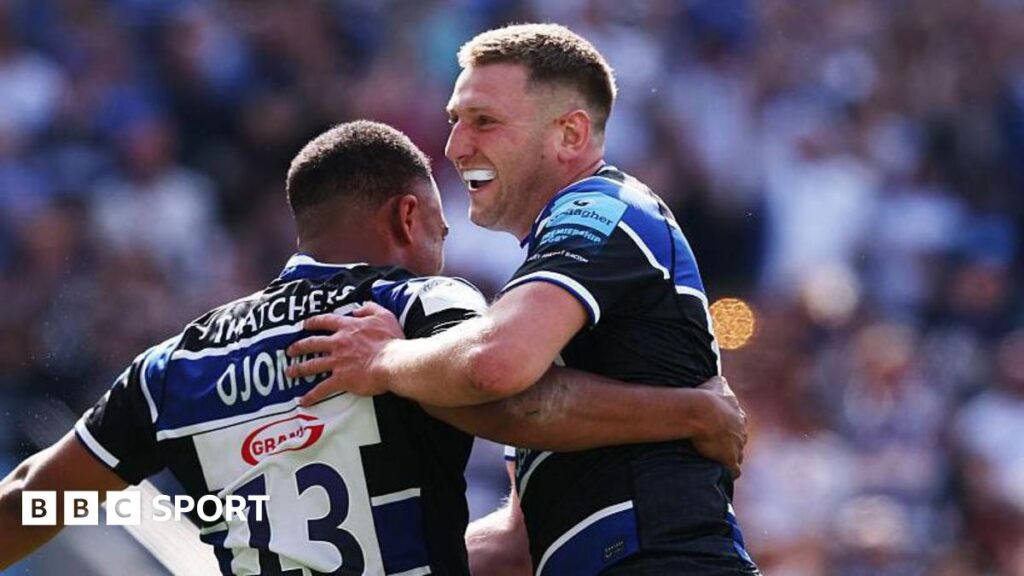 Max Ojomoh of Bath Rugby celebrates with team mate Finn Russell after scoring their second try during the Gallagher Premiership Rugby Final match between Bath Rugby and Leicester Tigers at Allianz Stadium on June 14, 2025 in London, England.