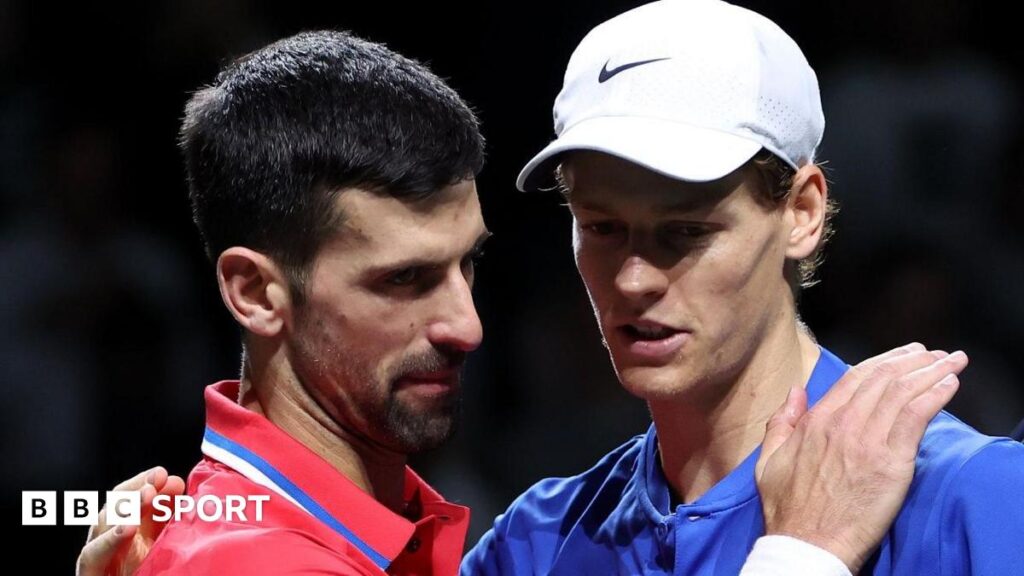 Novak Djokovic and Jannik Sinner congratulate each other after their match at the Davis Cup