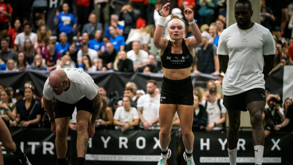 Lucy Procter doing burpee broad jumps at Hyrox
