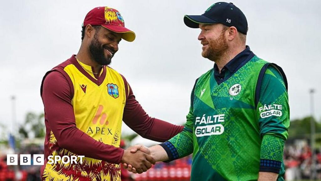 Ireland's Paul Stirling shakes hands with West Indies counterpart Shai Hope