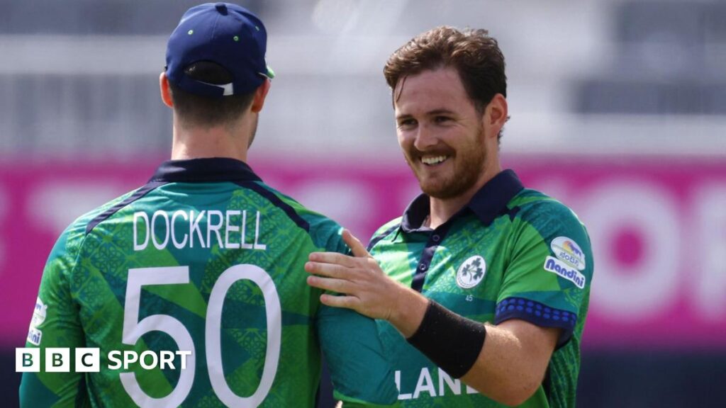 Mark Adair (right) celebrates a wicket with Ireland team-mate George Dockrell
