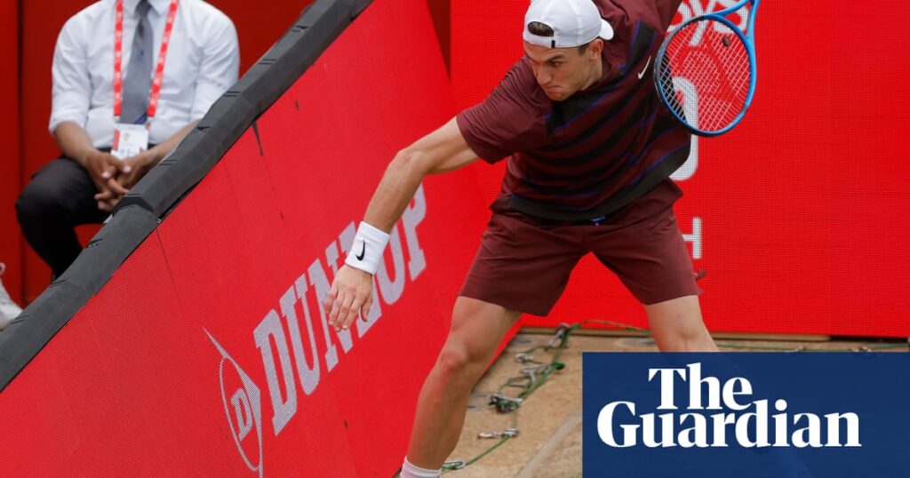 Jack Draper boils over and smashes advertising screen in defeat at Queen’s | Tennis