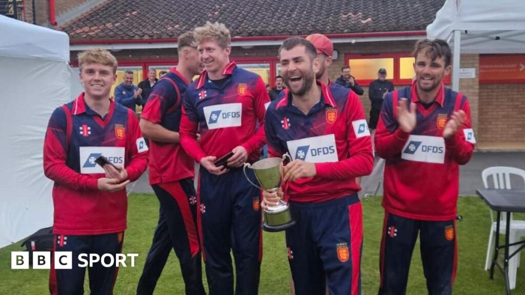 Jersey captain Charles Perchard holds the inter-island T20 trophy
