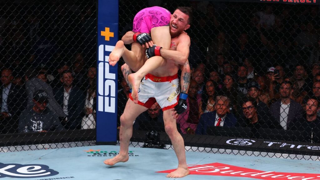 Merab Dvalishvili taps Sean O'Malley, retains title at UFC 316