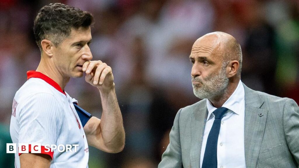 Poland striker Robert Lewandowski and Michal Probierz