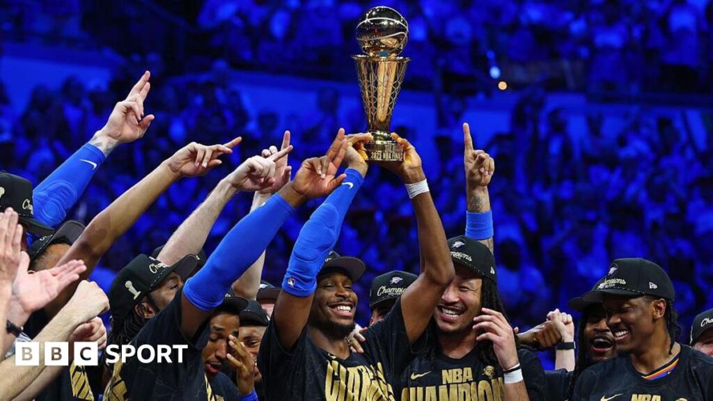 Shai Gilgeous-Alexander and the Oklahoma City Thunder with the NBA Trophy