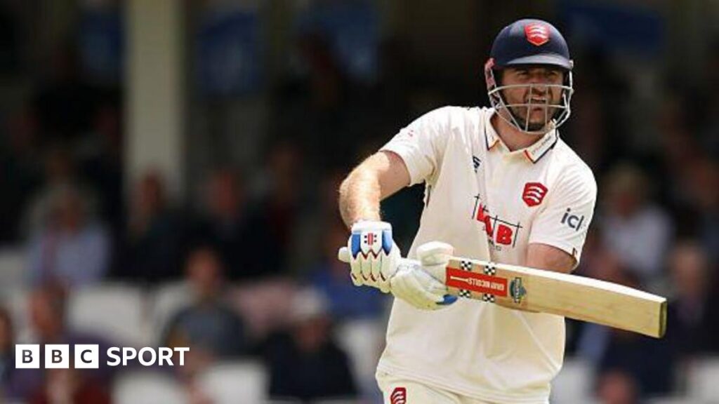 Paul Walter watches the ball as he plays a shot out through the off side during a match for Essex