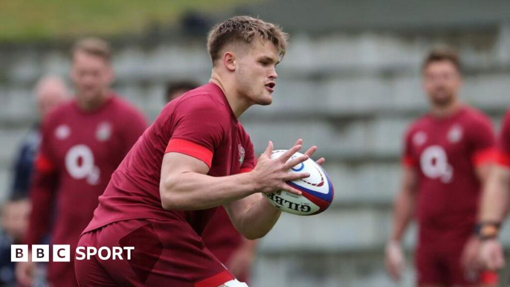 Guy Pepper runs with the ball during England training