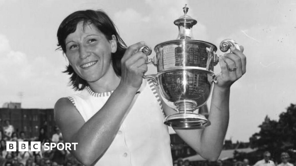 Olga Morozova holds the Queen's trophy