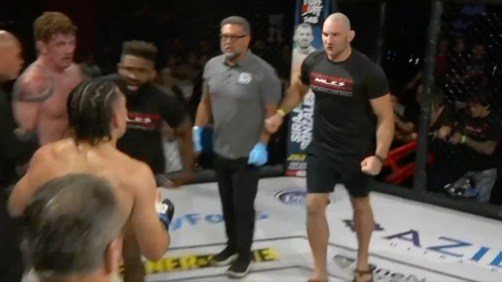 UFC star Sean Strickland rushes cage, punches regional fighter in head after taunt