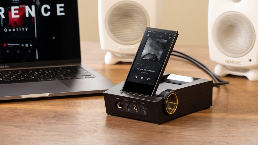 Astell&amp;Kern CA1000T on a desktop with white speakers and laptop