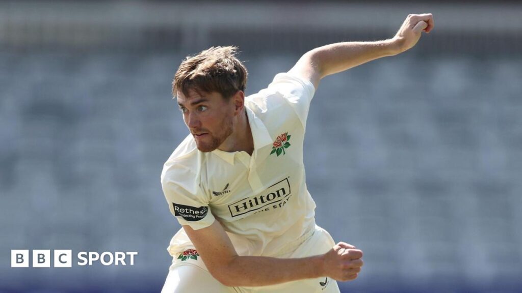 George Balderson bowling for Lancashire