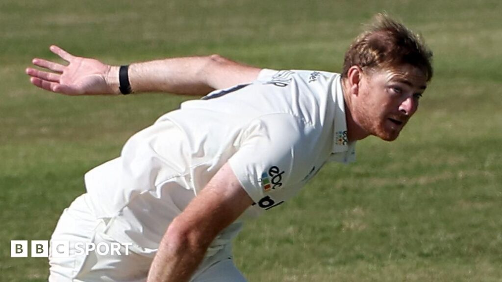 Worcestershire's Tom Taylor bowls