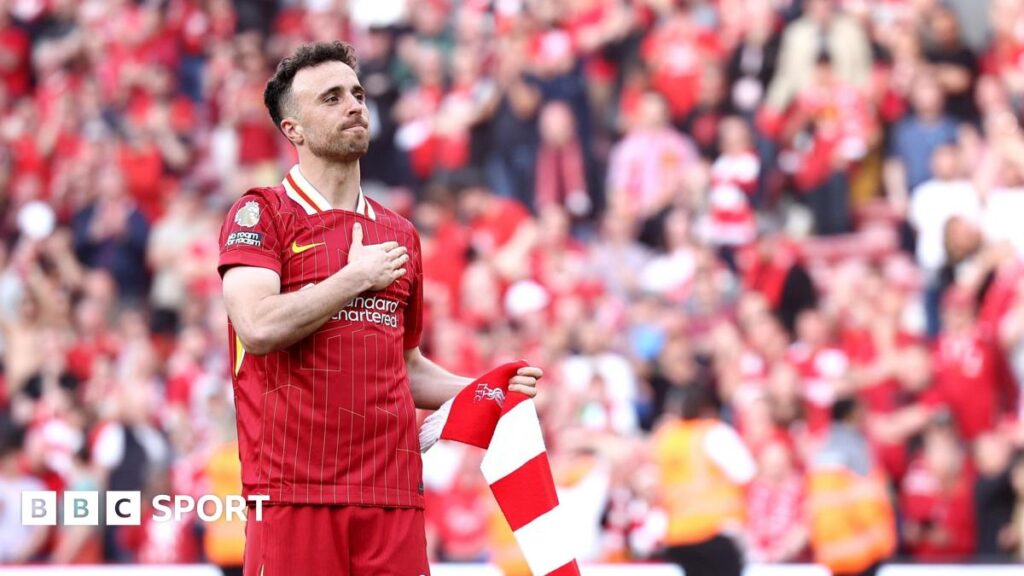 Diogo Jota gestures to Liverpool fans at Anfield with his hand on his chest