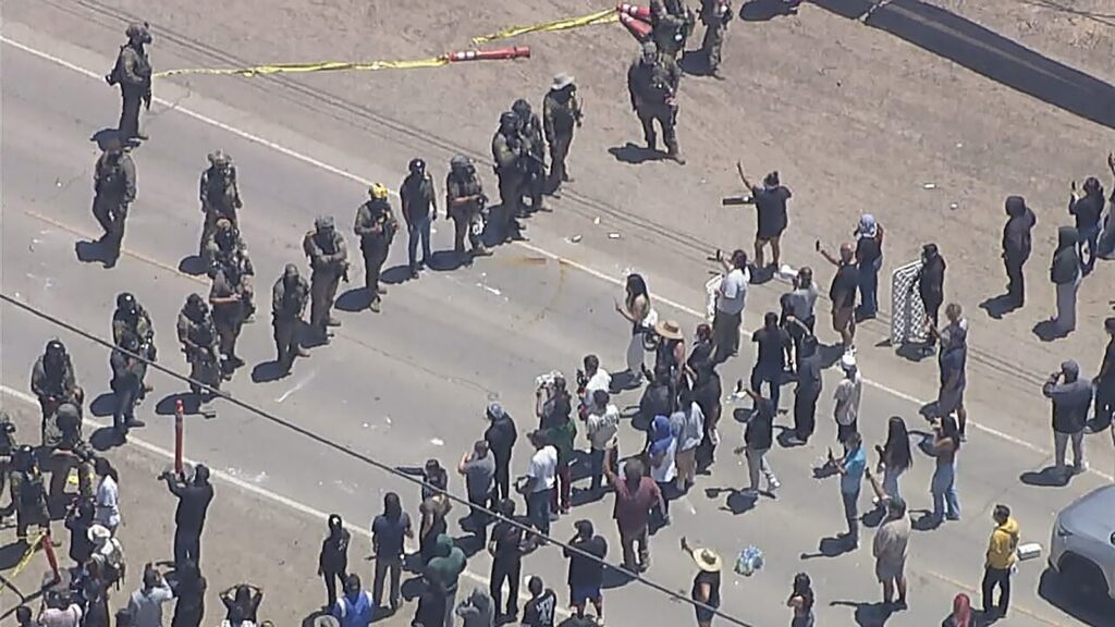 Federal agents clash with protesters during ICE raid at Southern California farm