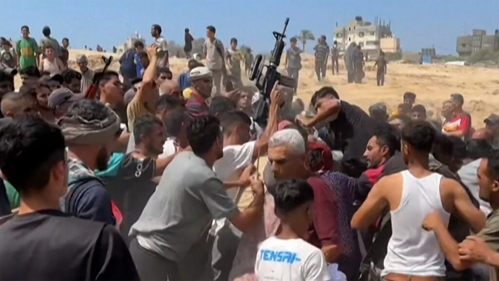 Gunfire at aid drop site as hungry Palestinians scramble for food