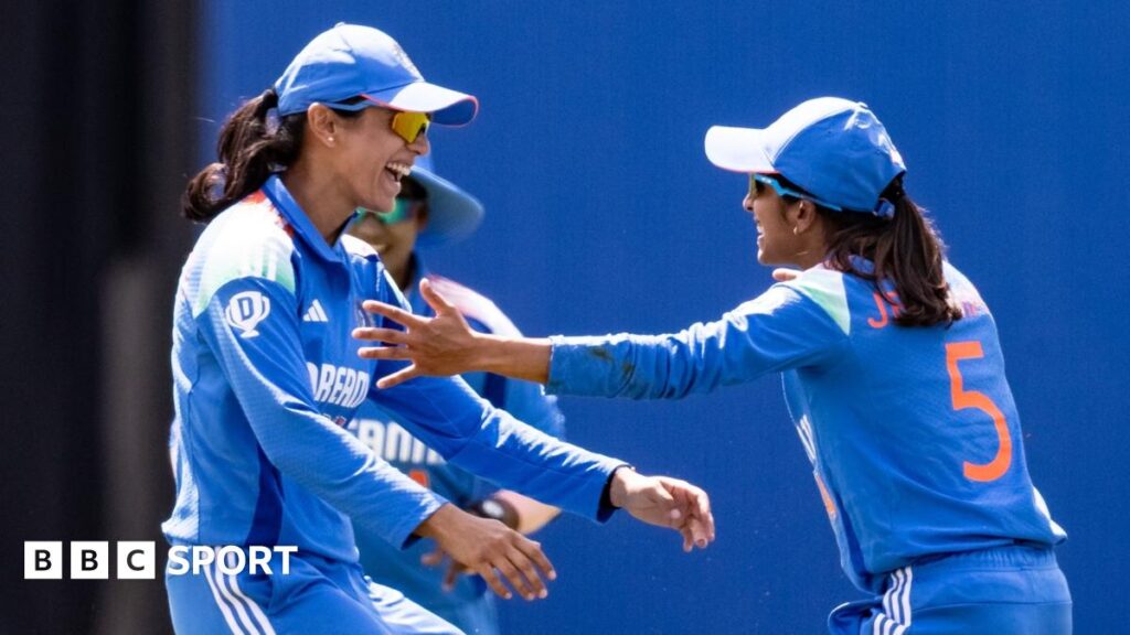 Jemimah Rodrigues of India (right) celebrates with team mates after taking a catch to dismiss Nat Sciver-Brunt of England during the 1st Women's ODI between England and India at Utilita Bowl