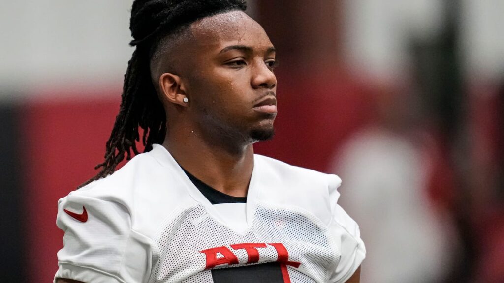 Michael Penix, Bijan Robinson arrive at training camp