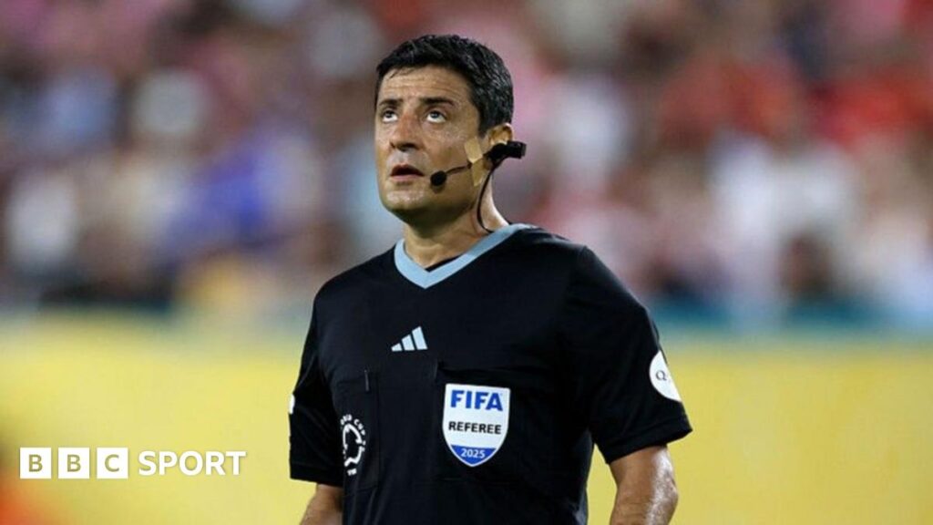 A referee wearing a body cam and microphone at the Club World Cup
