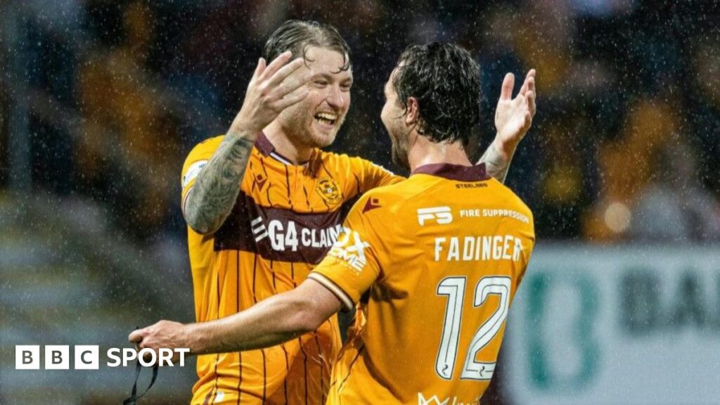 Stuart Findlay celebrates his early goal for Hearts