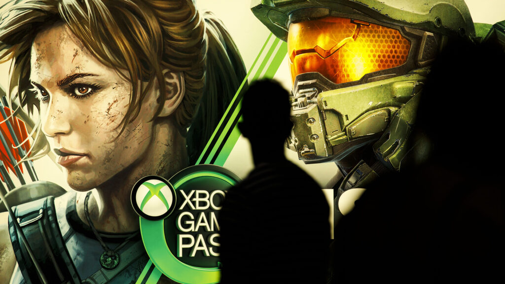 Xbox Game Pass on a wall at E3 with people walking by (silhouetted).
