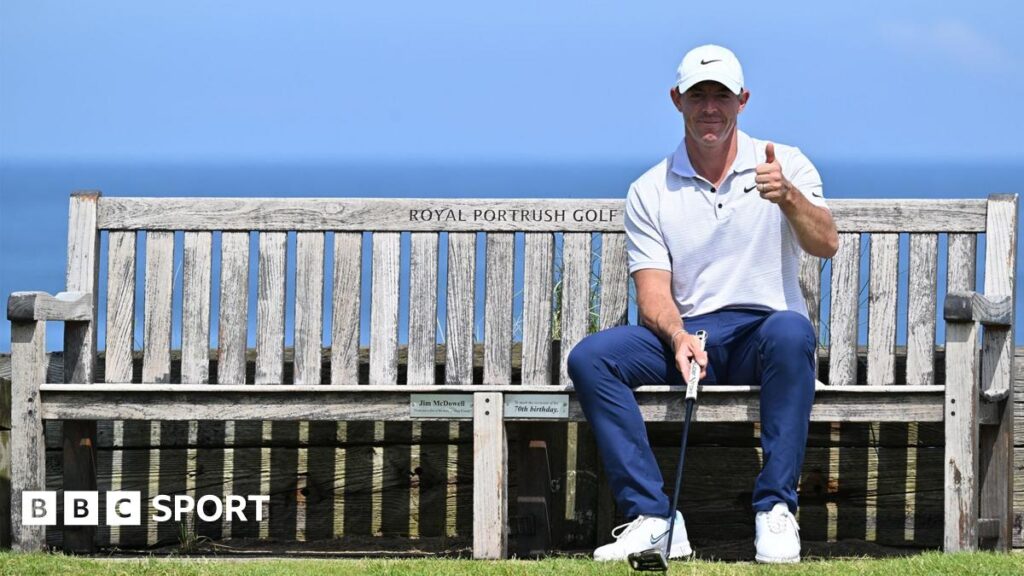 Rory McIlroy sits on the bench