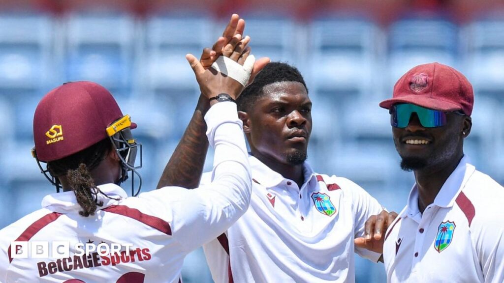 West Indies bowler Alzarri Joseph (centre) celebrates taking a wicket