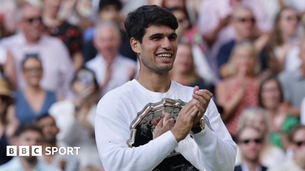 Carlos Alcaraz interacting with fans on court 14 before the Wimbledon final