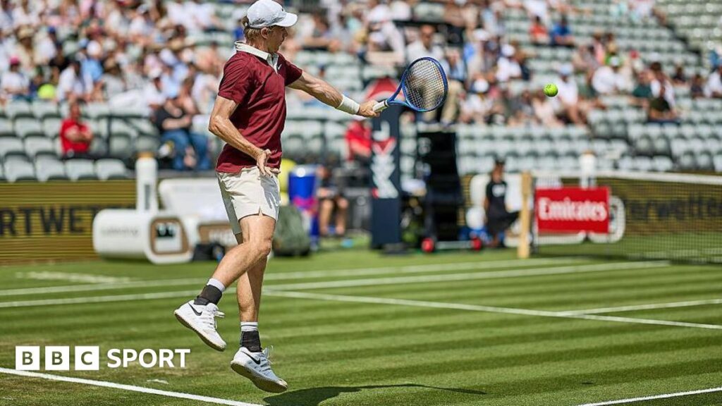 Denis Shapovalov in action at Wimbledon