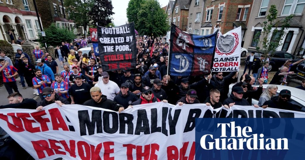 ‘It’s not fair’: Crystal Palace fans march in protest at demotion from Europa League | Crystal Palace