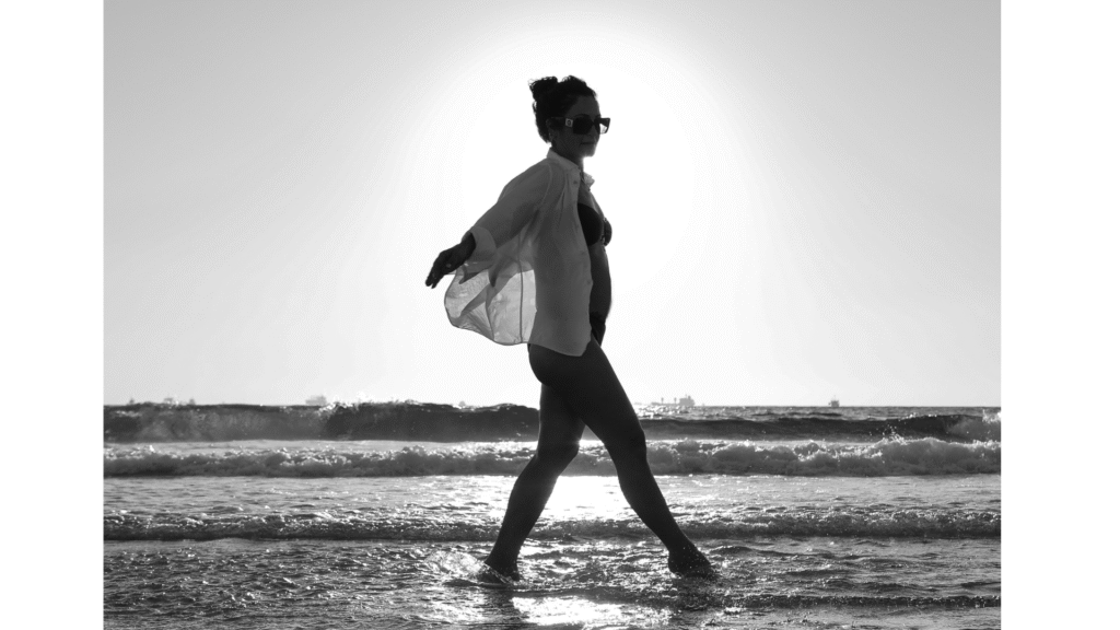 Woman walking toward a new life while thinking about her weekly horoscope for August 17-23, 2025