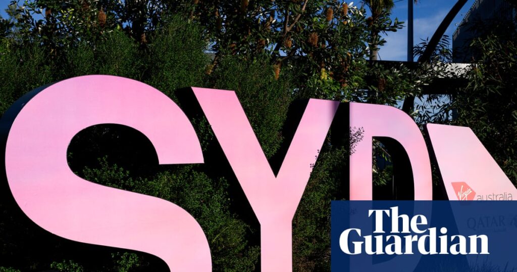 Man arrested after police firearm discharged inside Sydney domestic airport | Australia news