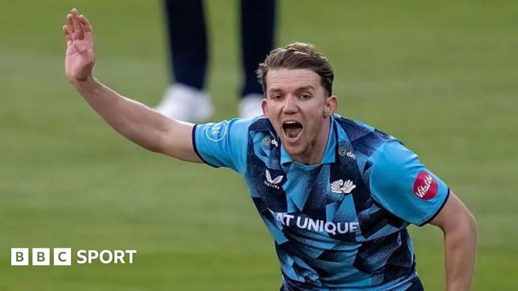 Yorkshire bowler Matt Milnes celebrates a wicket