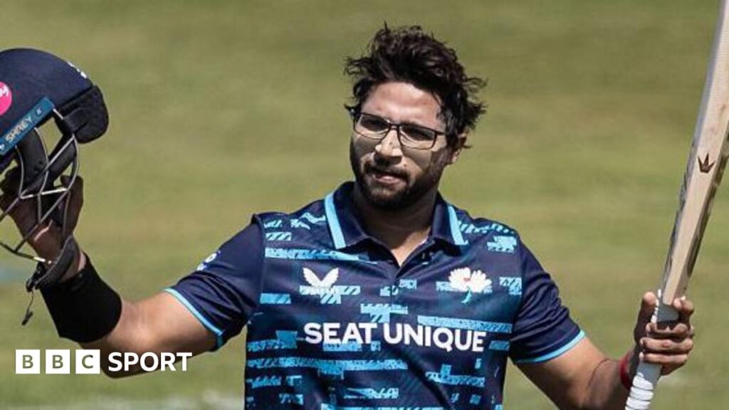 Yorkshire batsman Imam-ul-Haq acknowledges the crowd after scoring a century against Northamptonshire Steelbacks.