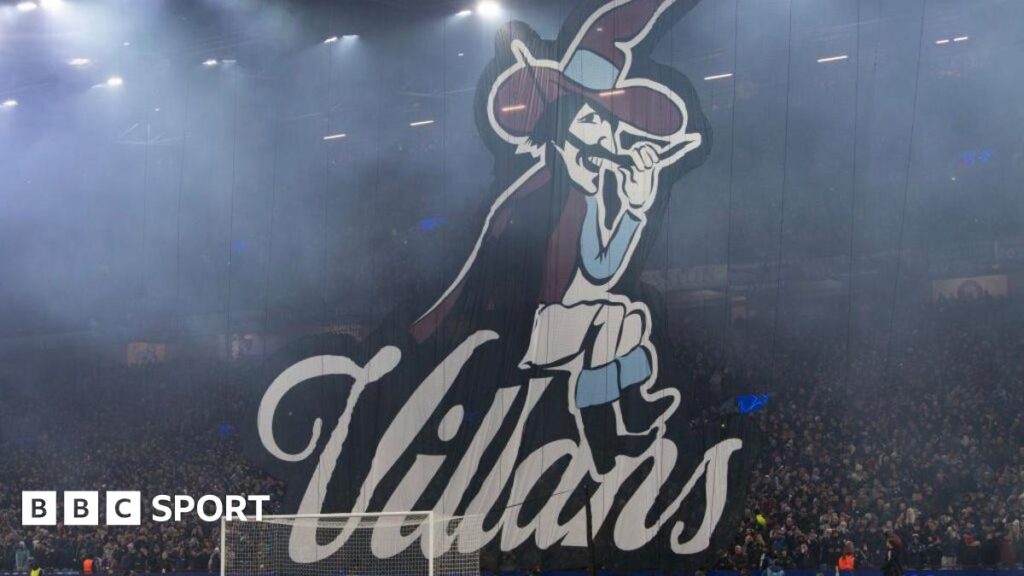 A giant banner is pictured showing Aston Villa's Villan nickname