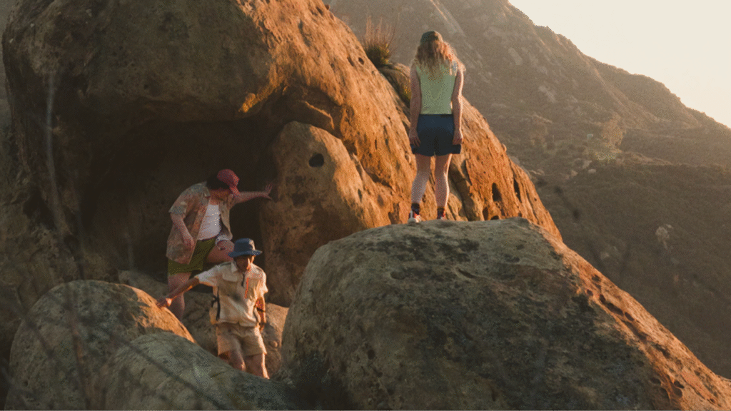 outdoorsy folks on a rock