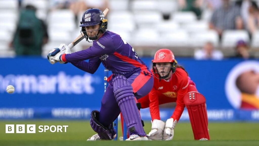 Northern Superchargers batter Phoebe Litchfield switch hits a ball for six runs during The Hundred