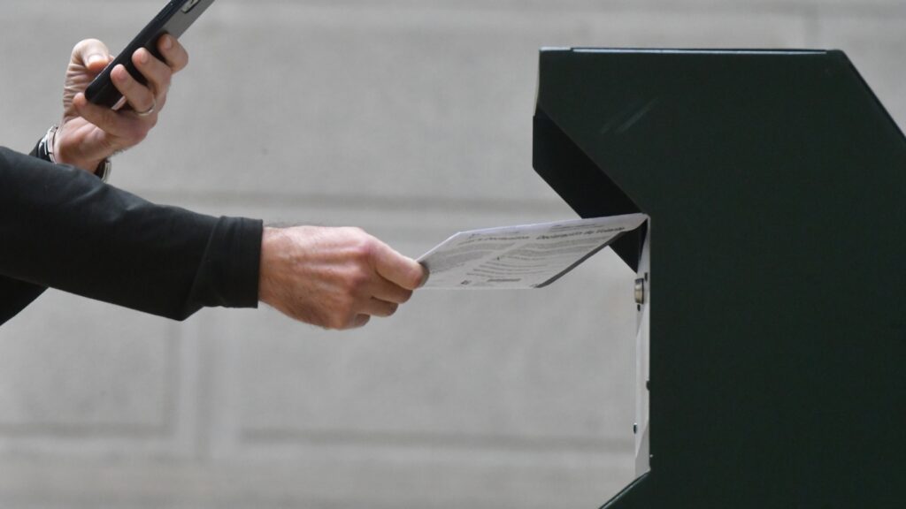 Trump wants to stop states from voting by mail and using voting machines : NPR