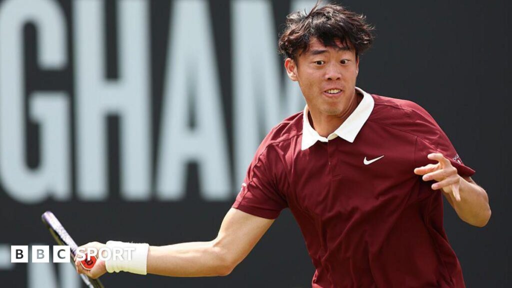 Coleman Wong hits a forehand at the US Open