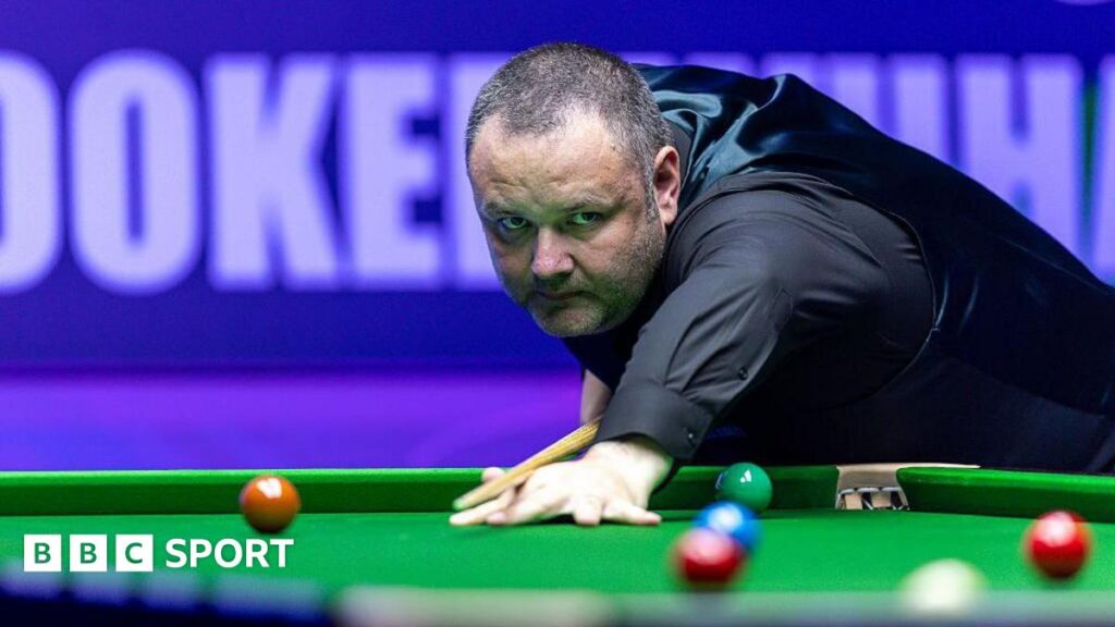 Stephen Maguire eyes up a tricky brown during the Wuhan Open