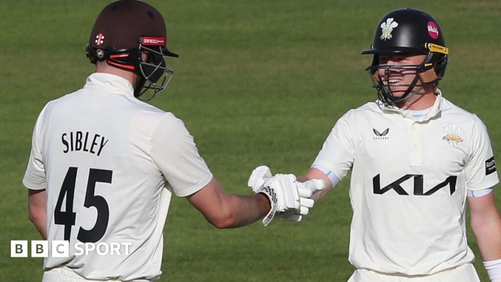 Dom Sibley and Ollie Pope bump fists