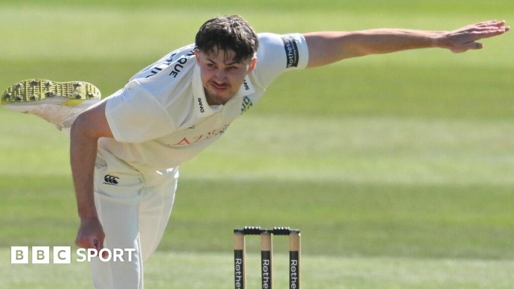 Bowler Paul Coughlin in action for his home county of Durham