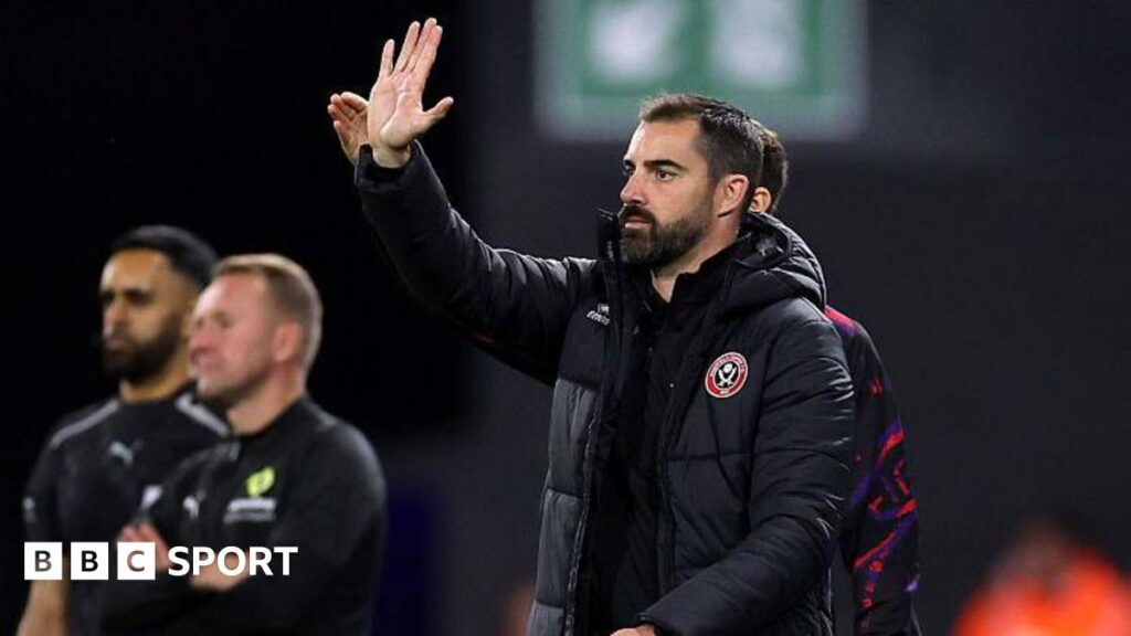 Ruben Selles signals to his Sheffield United players from the touchline at Portman Road